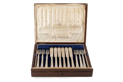 Lot 720 - A set of twelve George V silver fish knives...