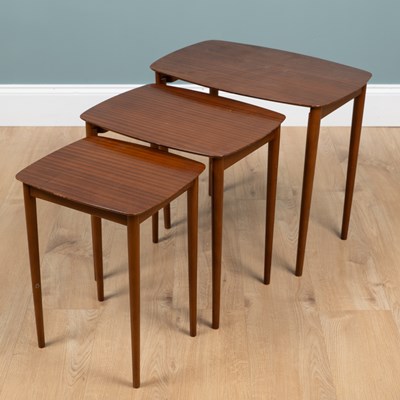 Lot 1046 - A nest of three teak tables by Everest