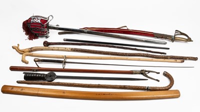 Lot 550 - A collection of swords and sticks