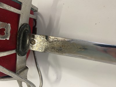 Lot 550 - A collection of swords and sticks