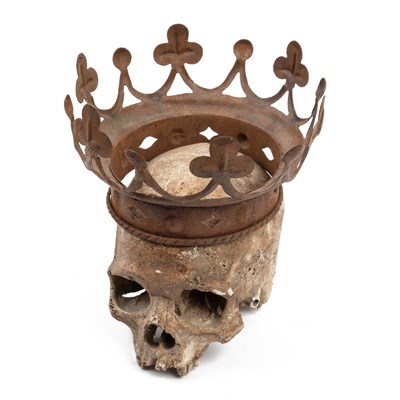 Lot 553 - A crowned plaster skull