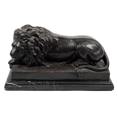 Lot 79 - A patented bronze sculpture of a recumbent lion