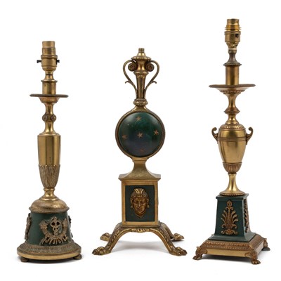 Lot 713 - Three early 20th century French Empire style brass table lamps