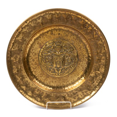 Lot 560 - A brass alms dish