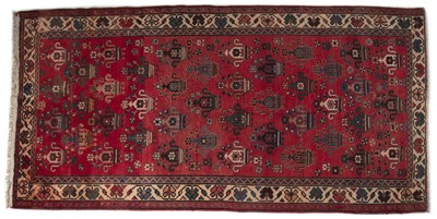 Lot 1262 - A Quashqai style hand-woven rug