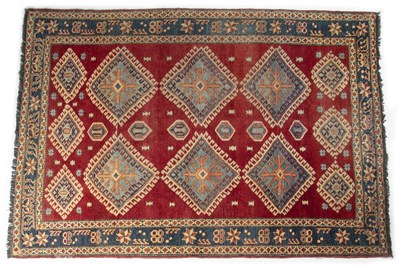 Lot 1303 - A Kazak style rug