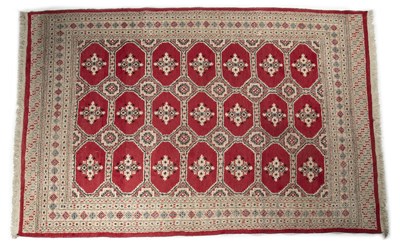 Lot 1277 - A Middle Eastern Bokhara style rug