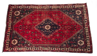 Lot 1305 - A Middle Eastern Shiraz style rug