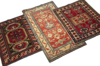 Lot 1247 - Three Afghan Kazak-style rugs