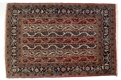 Lot 1309 - A Middle Eastern Qom style woolen rug