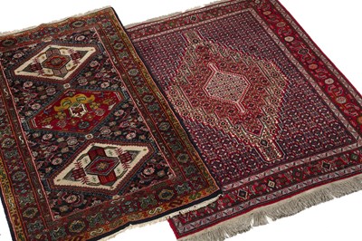 Lot 1295 - Two Middle Eastern woollen rugs