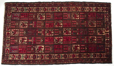 Lot 1314 - A Middle Eastern polychrome rug