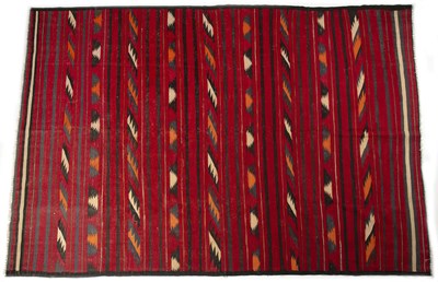 Lot 1244 - A Middle Eastern flatweave rug