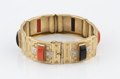 Lot 199 - A gem set panel bracelet, composed of six...