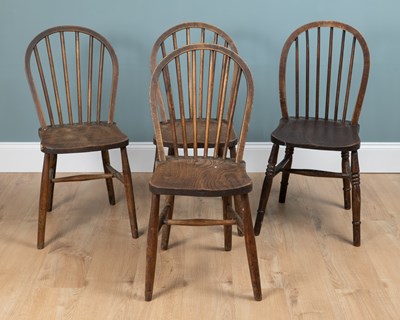 Lot 567 - A Harlequin set of four stick-back kitchen chairs