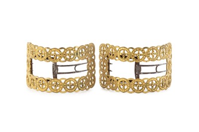 Lot 606 - A pair of George III gilt metal shoe buckles,...