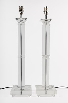 Lot 1144 - A pair of facetted clear glass table lamps