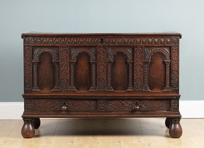 Lot 575 - An 18th century oak mule chest