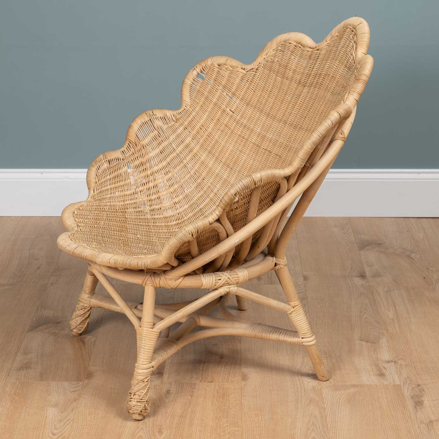 Lot 1449 - A rattan 'Venus' chair by Soane of London