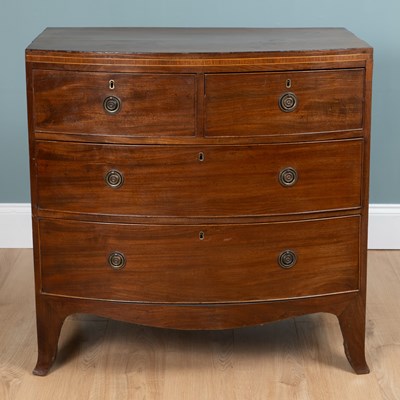 Lot 232 - An early to mid-19th century mahogany bow-fronted chest of drawers