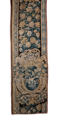 Lot 409 - An 18th century French verdure tapestry fragment