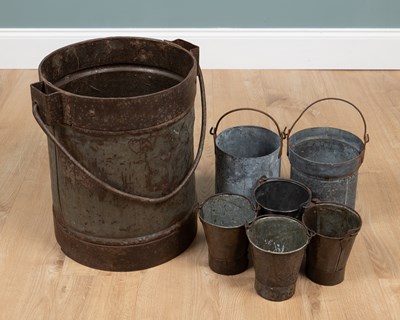 Lot 1411 - A group of seven various Indian buckets and pails