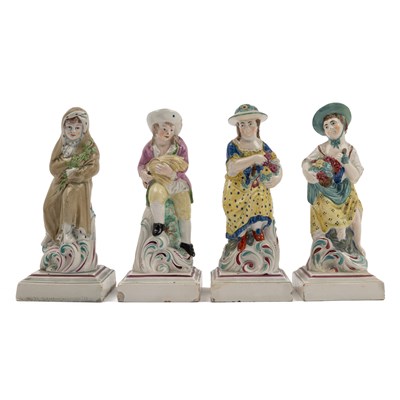 Lot 36 - A set of four 18th century pearlware figures, ‘The Seasons’ by Neale & Co