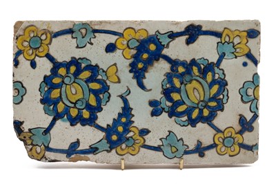 Lot 40 - A 17th or 18th century polychrome Safavid cuerda seca tile