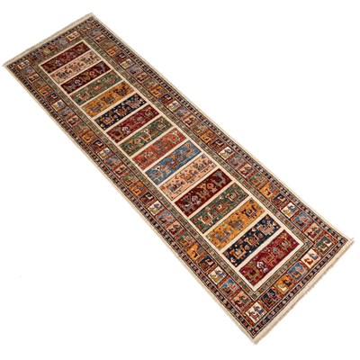 Lot 1304 - A modern Eastern polychrome runner