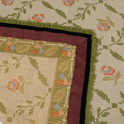 Lot 1267 - An antique woollen rug together with a European rug