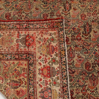 Lot 1267 - An antique woollen rug together with a European rug