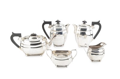 Lot 765 - A George V silver five piece tea set,...