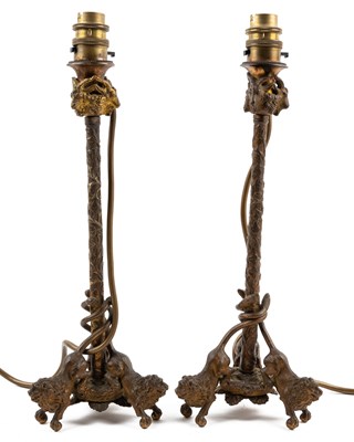 Lot 719 - A pair of French gilt bronze candlesticks