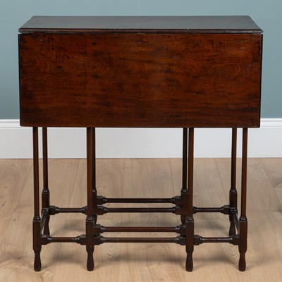 Lot 254 - A George III mahogany drop-leaf spider leg table