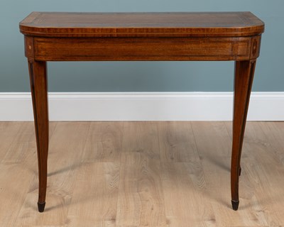 Lot 55 - A George III mahogany fold-over tea table