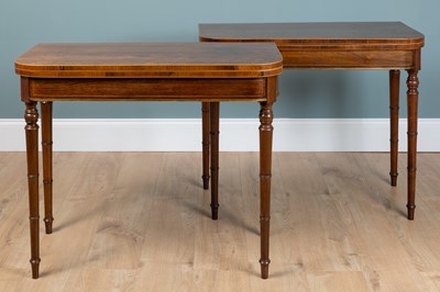 Lot 294 - A pair of George III rosewood fold-over card tables