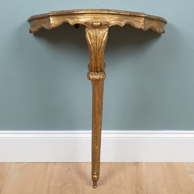 Lot 1003 - An Italian gilt console table