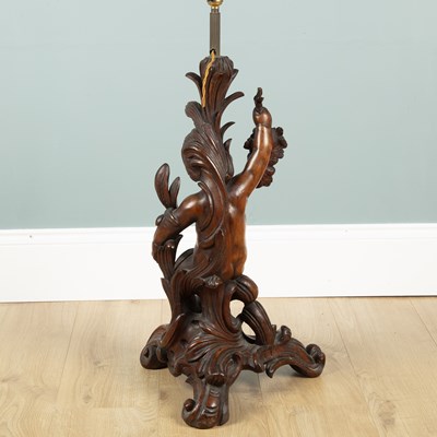 Lot 592 - An Antique continental walnut table lamp