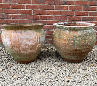 Lot 1434 - A pair of ovoid terracotta plant pots