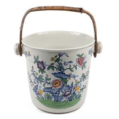 Lot 594 - A 19th-century pottery pail with a wicker handle