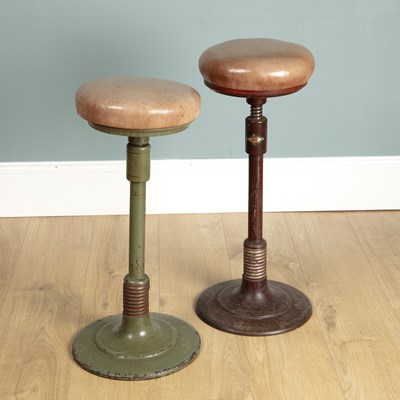 Lot 1165 - Two leather-topped cast iron adjustable dentist's stools