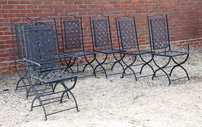 Lot 1396 - A set of eight wrought iron garden chairs