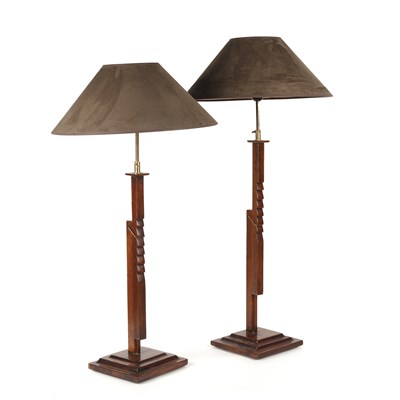 Lot 600 - A pair of ratchet adjustable oak table lamps