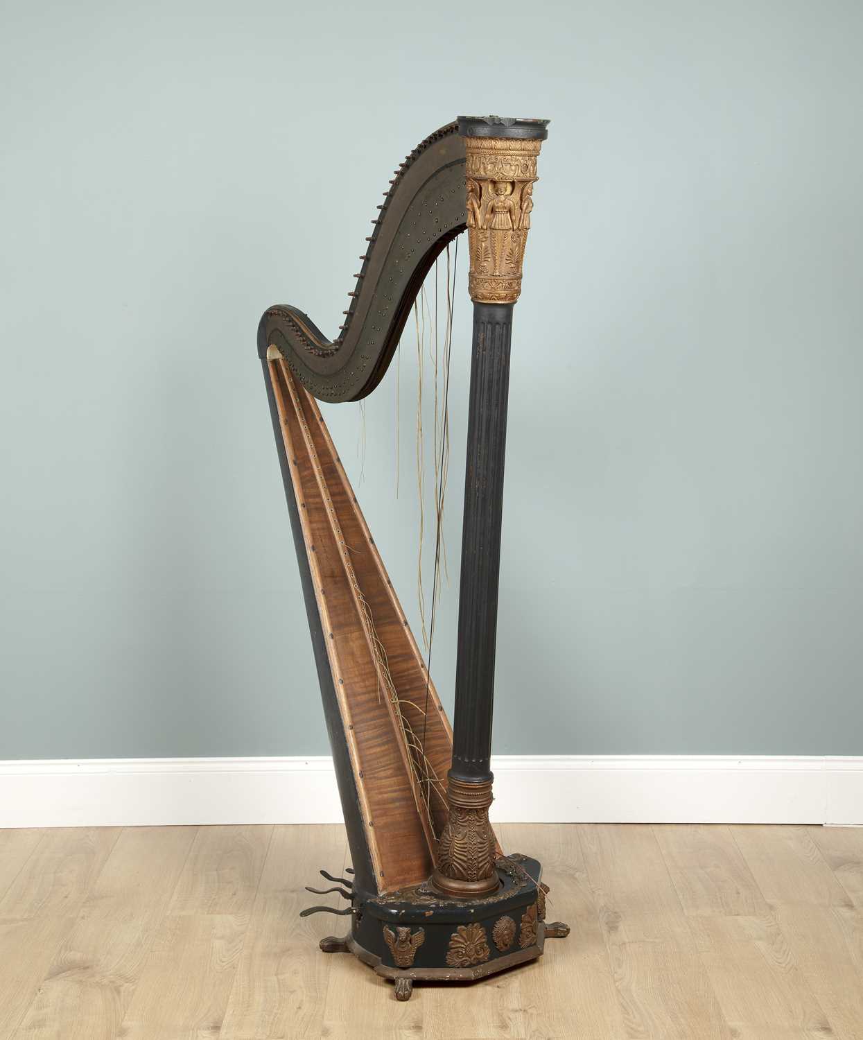 Lot 300 - A 19th century Egyptian revival ebonised Harp