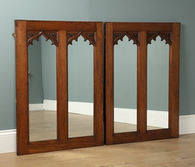 Lot 608 - A pair of oak Arts & Crafts wall mirrors