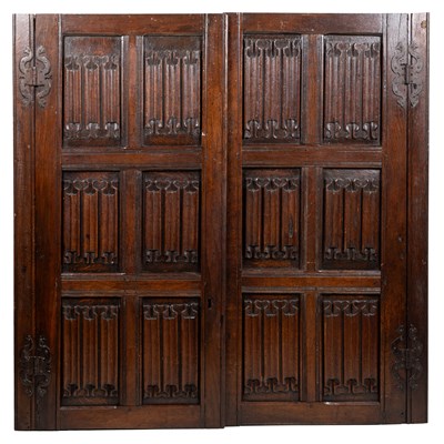 Lot 1397 - A pair of antique oak linen-fold paneled cupboard doors