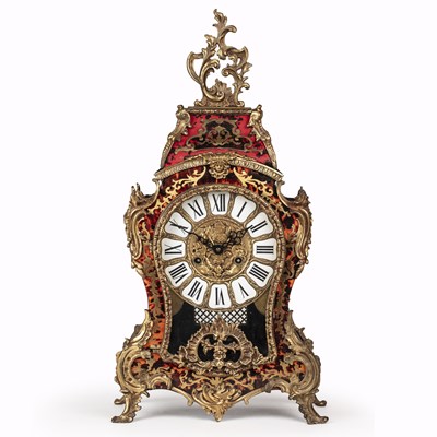 Lot 302 - A French Boulle style mantel clock