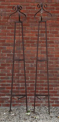 Lot 1380 - A pair of wrought iron garden obelisks