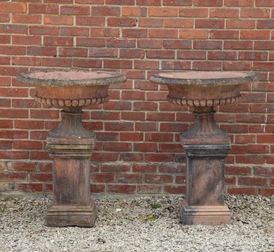 Lot 1343 - A pair of terracotta campana style wide garden urns