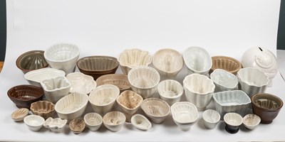 Lot 576 - A collection of old ceramic jelly moulds